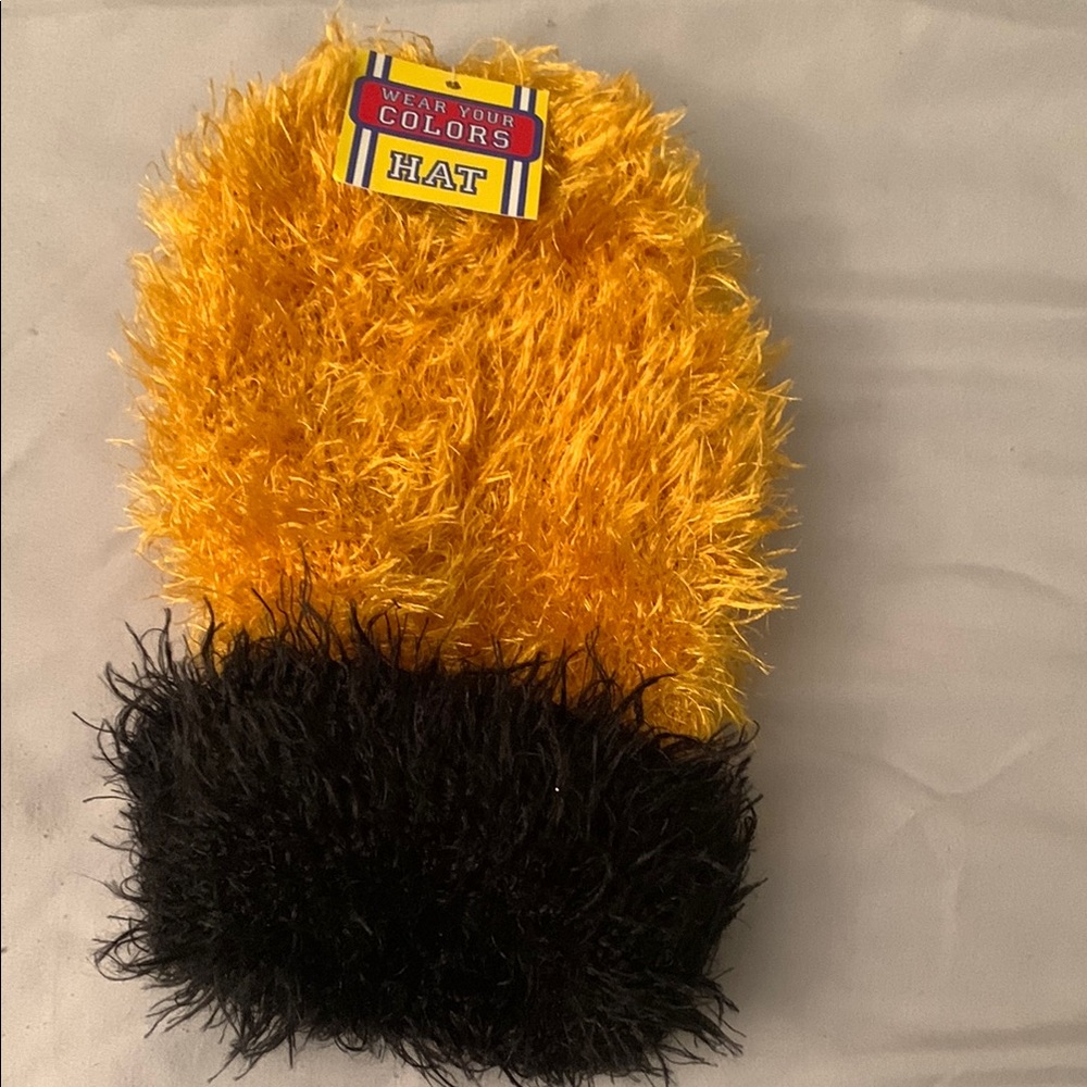 Vibrant gold and black fuzzy hat
